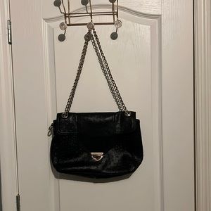 Black and gold faux leather purse